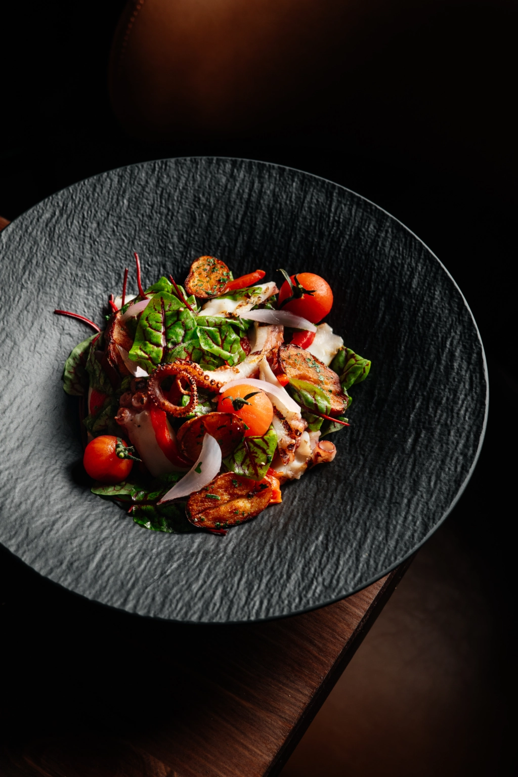 Octopus salad with mixed greens and citrus dressing at Terra Brooklyn